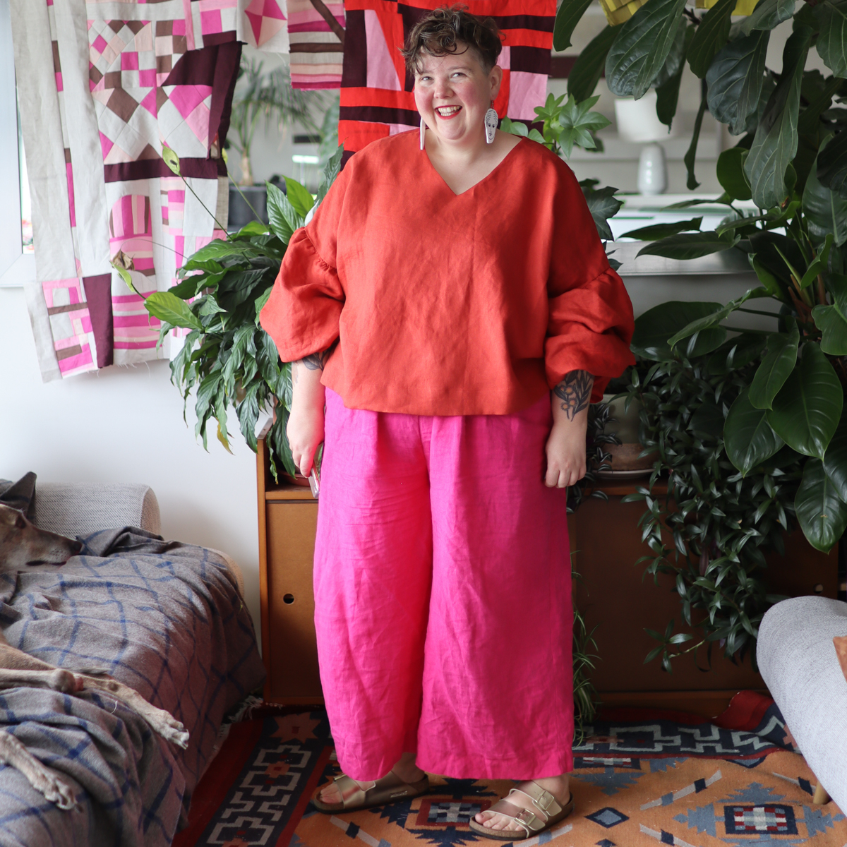 Jess, a fat babe, wears an amazing red linen top and bright pink enormous linen trousers from her pattern range